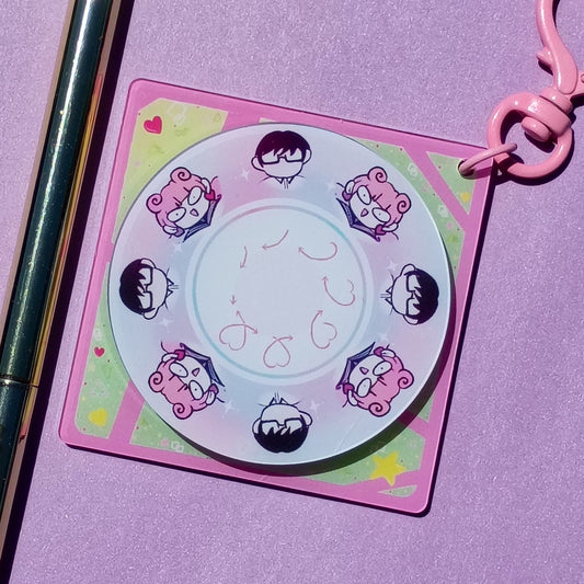 Polar Opposites spinning keychain